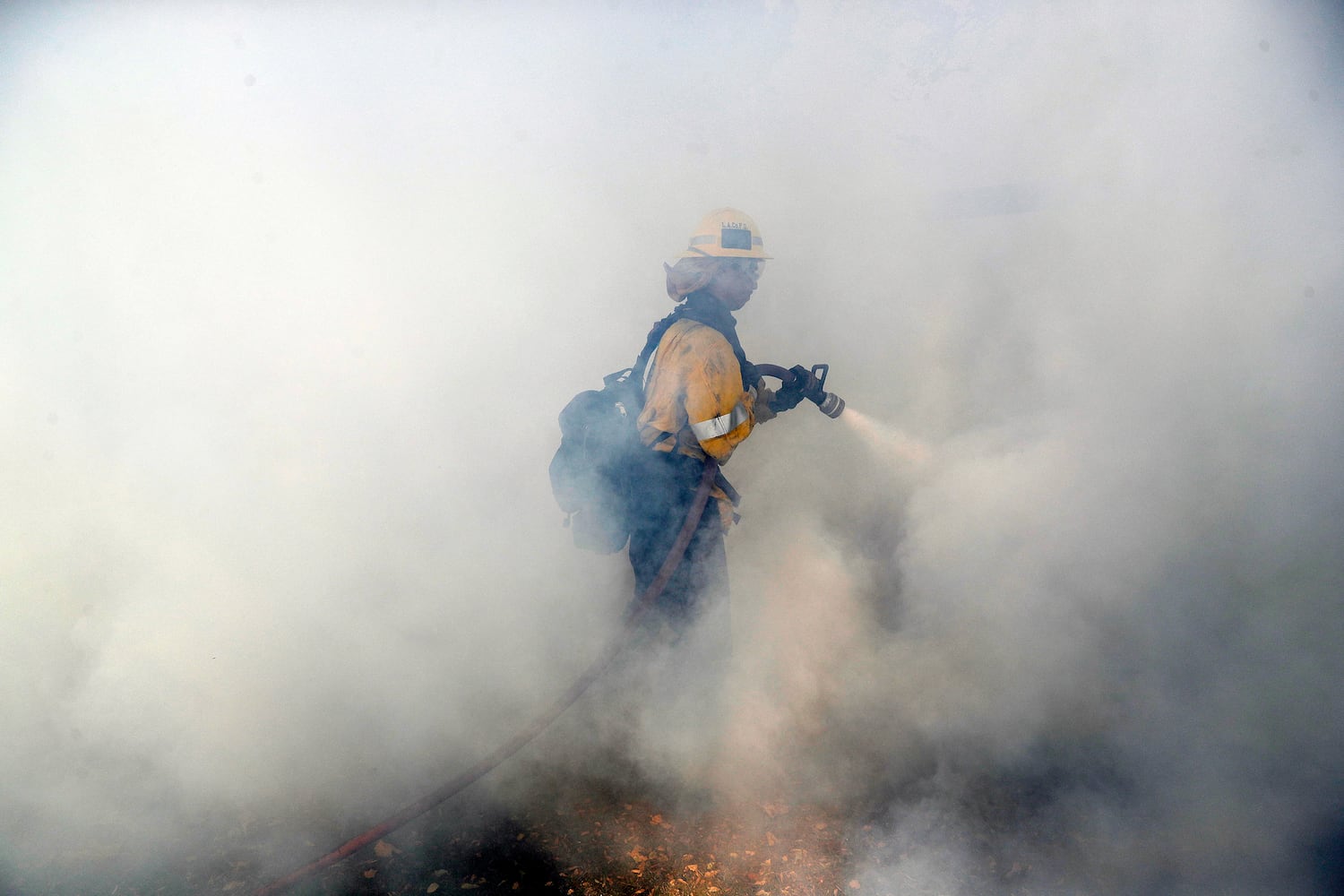 Photos: Deadly wildfires blaze through northern, southern California