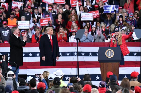 December 5, 2020 Valdosta - U.S. Sen. Kelly Loeffler speaks as President Donald Trump and U.S. Sen. David Perdue look on during the Republican National Committee's Victory Rally at the Valdosta Flying Services in Valdosta on Saturday, December 5, 2020. Trump urged residents to vote for Loeffler and Perdue in next month's runoffs in Georgia. (Hyosub Shin / Hyosub.Shin@ajc.com)