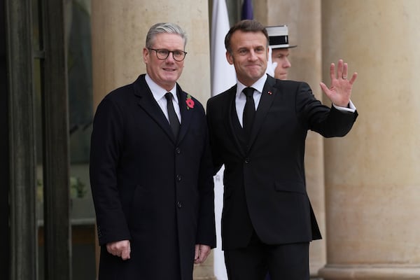 French President Emmanuel Macron, right, gestures with British Prime Minister Keir Starmer Monday, Nov. 11, 2024 at the Elysee Palace in Paris, before ceremonies marking the 106th anniversary of the Armistice, a celebration of their countries' friendship, as nations across the world pay tribute to their fallen soldiers in World War I. (AP Photo/Aurelien Morissard)