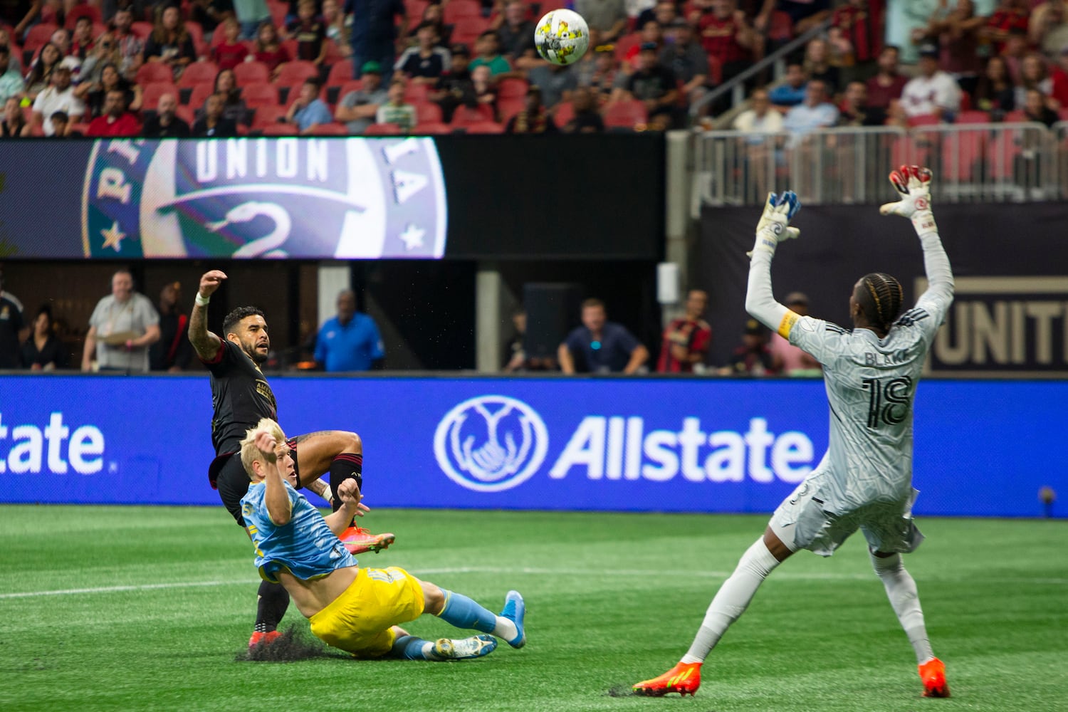 Dom Dwyer, forward for Atlanta United, makes a shot on Philadelphia Union goalie Andre Blake. CHRISTINA MATACOTTA FOR THE ATLANTA JOURNAL-CONSTITUTION.