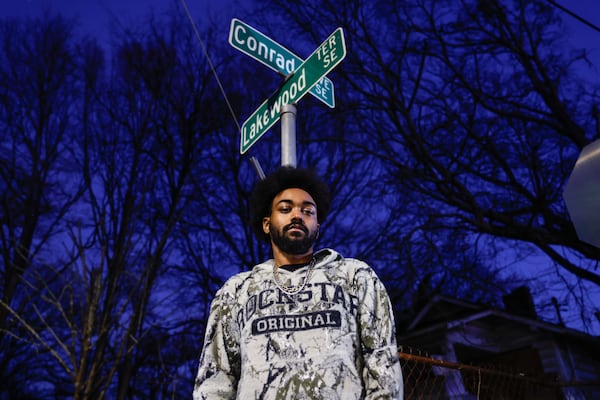 Makari Brown, son of Organized Noize co-founder Sleepy Brown poses for a portrait on the corner of Conrade Ave and Lakewood Terrace near the Dungeon Family home in Atlanta on Monday, Feb. 17, 2025. Natrice Miller/ AJC)