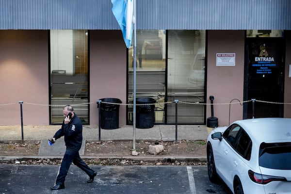 Police were on the scene Monday at the Honduran Consulate on Peachtree Industrial Boulevard. (Ben Hendren for the Atlanta Journal-Constitution)