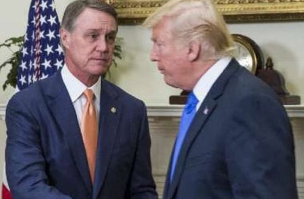 U.S. Sen. David Perdue, left, scored No. 2 in Congress on Axios' Trump Loyalty Index. He was the top senator on the scale, which measures both voting records and commentary in support of President Donald Trump.