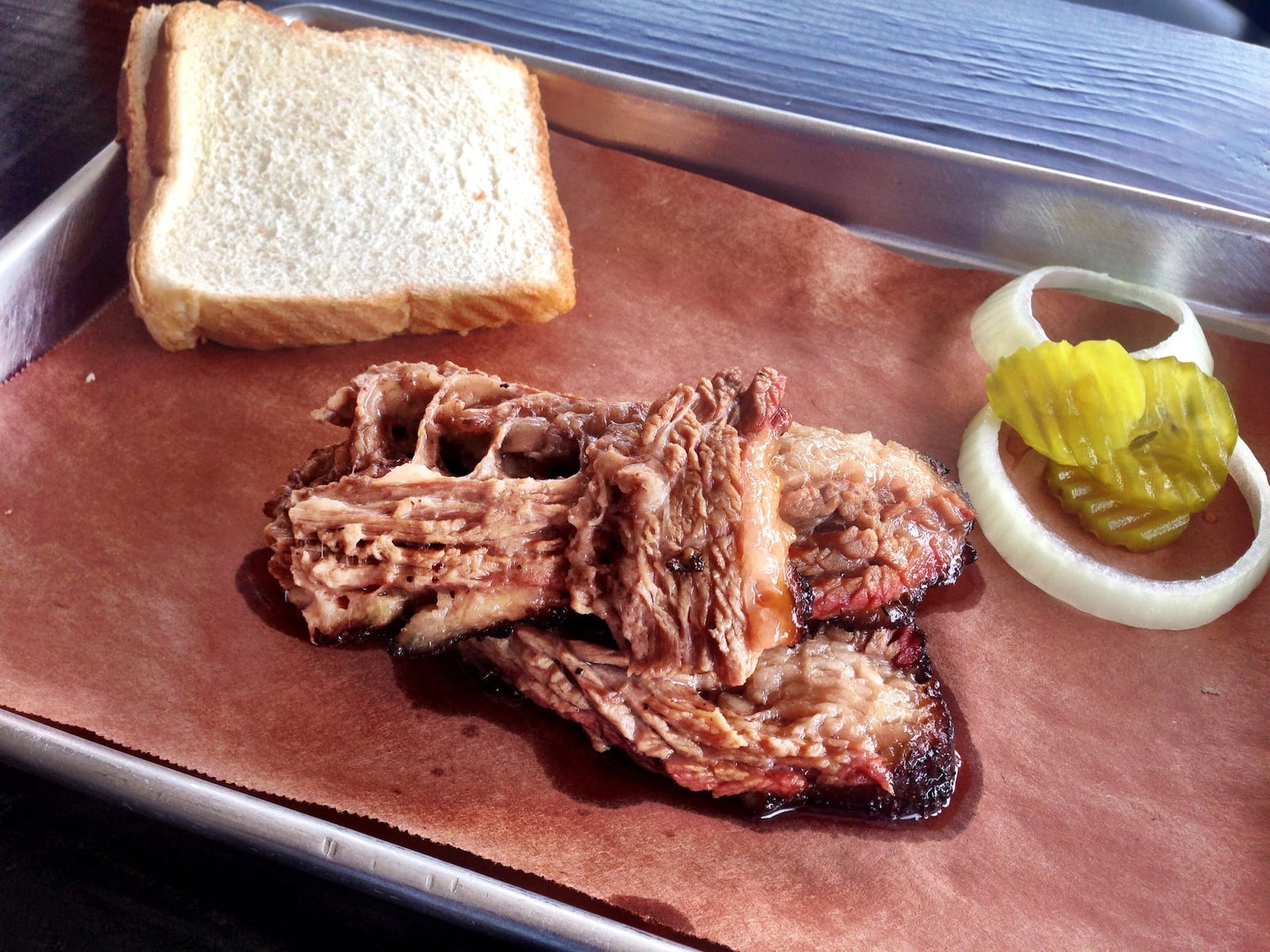 Brisket sliced from the fatty side of the cut yields tender meat, dripping with rendered fat. CONTRIBUTED BY WYATT WILLIAMS