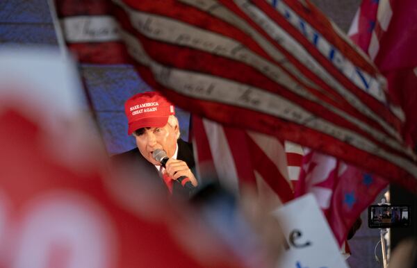 Lin Wood fires up supporters during a �Stop the Steal� rally in Alpharetta on Dec. 2, 2020. Ben Gray for the Atlanta Journal-Constitution