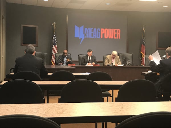 MEAG board members prepare for vote. LEFT TO RIGHT: L. Tim Houston Sr, James Fuller (MEAG CEO) and Steve Tumlin. The board unanimously voted to support continued expansion of nuclear plant Vogtle.