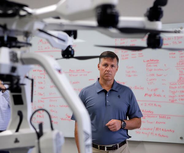 August 16, 2016 - Cartersville - Will Lovett, Managing Director of Unmanned Systems at Phoenix Air, in the new drone facility. Phoenix Air in Cartersville gave a tour of its "Ebola plane", a Gulfstream III with an Aeromedical Biological Containment System ( ABCS ), which more recently has been used to transport Lassa fever patients. It also showed it's Containerized Biological Containment System (CBCS), which can handle more patients, during a visit by Sen. David Perdue. BOB ANDRES /BANDRES@AJC.COM