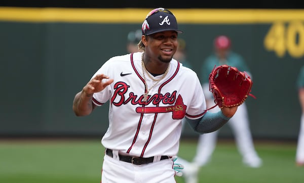 Ronald Acuna participates in a fielding drill during Monday's All-Star activities in Seattle. (AP photo/Ted Warren)