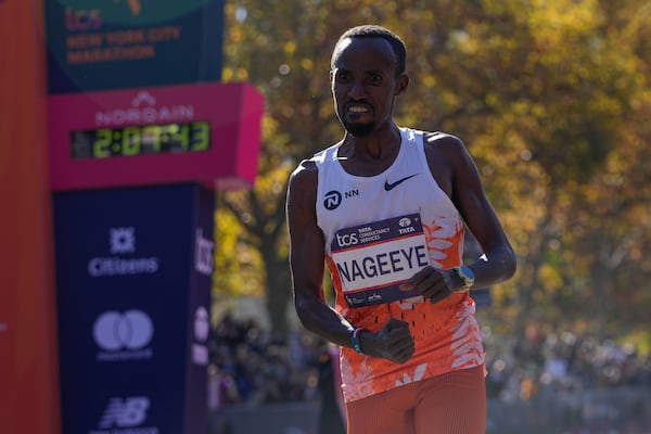 Abdi Nageeye, of the Netherlands, crosses the finish line to win the men's division of the New York City Marathon, Sunday, Nov. 3, 2024, in New York. (AP Photo/Frank Franklin II)