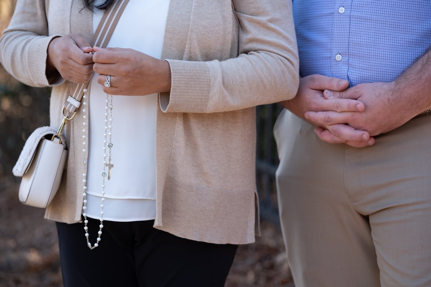 Jansen and Donovan Head, of Woodstock, say the rosary at a makeshift memorial to former President Jimmy Carter at the Carter Center in Atlanta on Monday, Dec. 30, 2024. Donovan Head had met Carter a few times and said he had a huge impact on him.  Ben Gray for the Atlanta Journal-Constitution