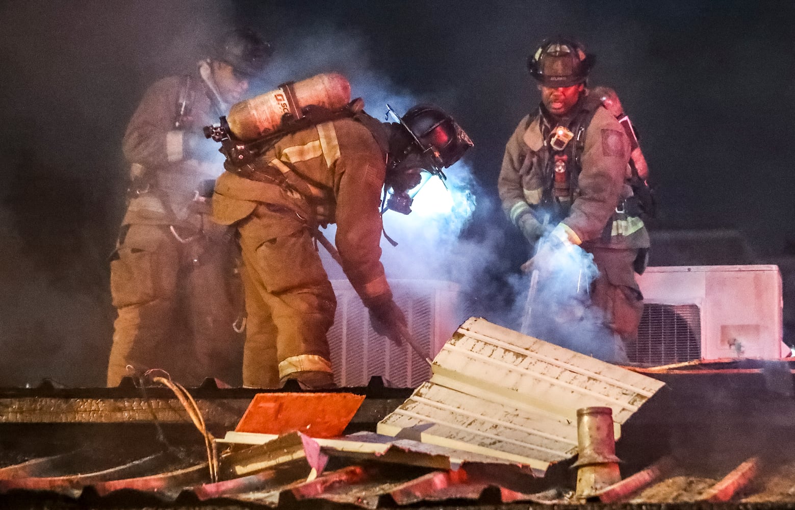 Fire broke out at the Buckhead Tin Lizzy’s Cantina on Tuesday morning, Sept. 20, 2022, sending huge flames shooting high above the roofline. Firefighters were able to extinguish the bulk of the flames in the first five minutes, according to Atlanta fire Battalion Chief Quincey Watts. It took hours more to punch holes in the roof once fire spread into the ceiling, he said. (John Spink / John.Spink@ajc.com)

