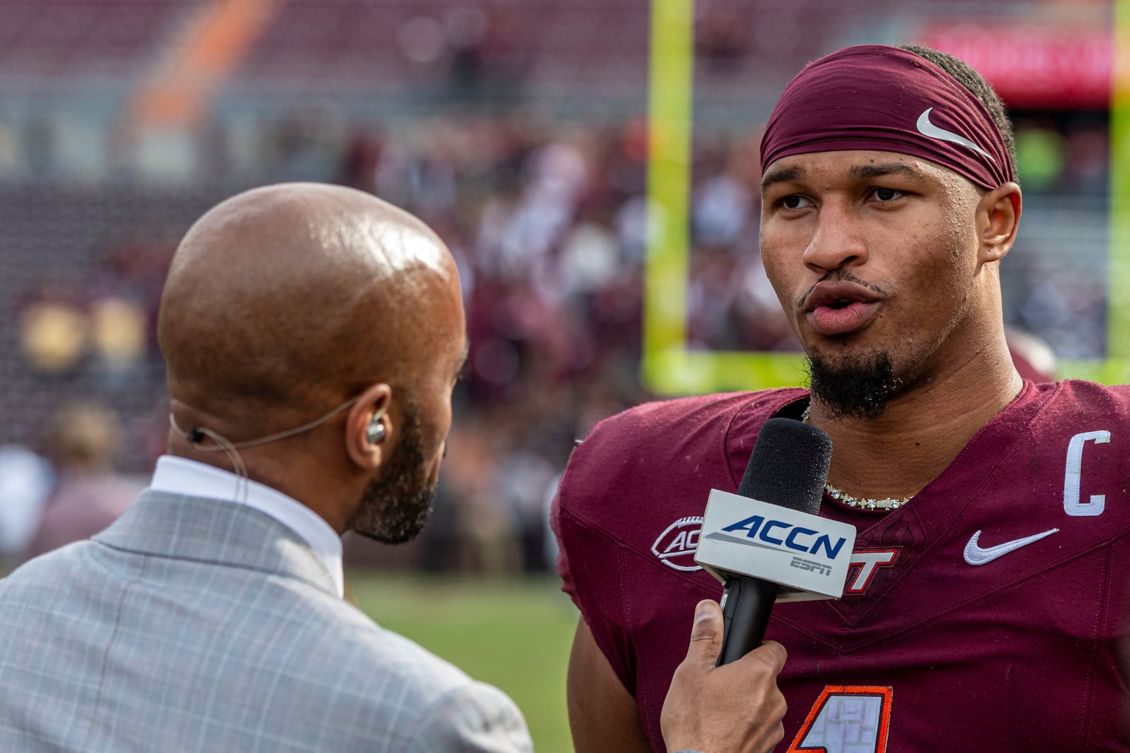 Virginia Tech's Kyron Drones (1) talks with media after an NCAA college football game against Georgia Tech, Saturday, Oct. 26, 2024, in Blacksburg, Va. (AP Photo/Robert Simmons)