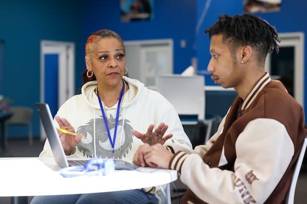 Science content coach Alisa TenHoopen (left) of Gwinnett County Acceleration Academies works with Jasiah Rollins, 19, of Duluth, on Wednesday, Nov. 1, 2023, in Duluth. The Acceleration Academies gives Gwinnett County students who have dropped out of high school a chance to finish their diplomas in a more independent environment. (Jason Getz / Jason.Getz@ajc.com)