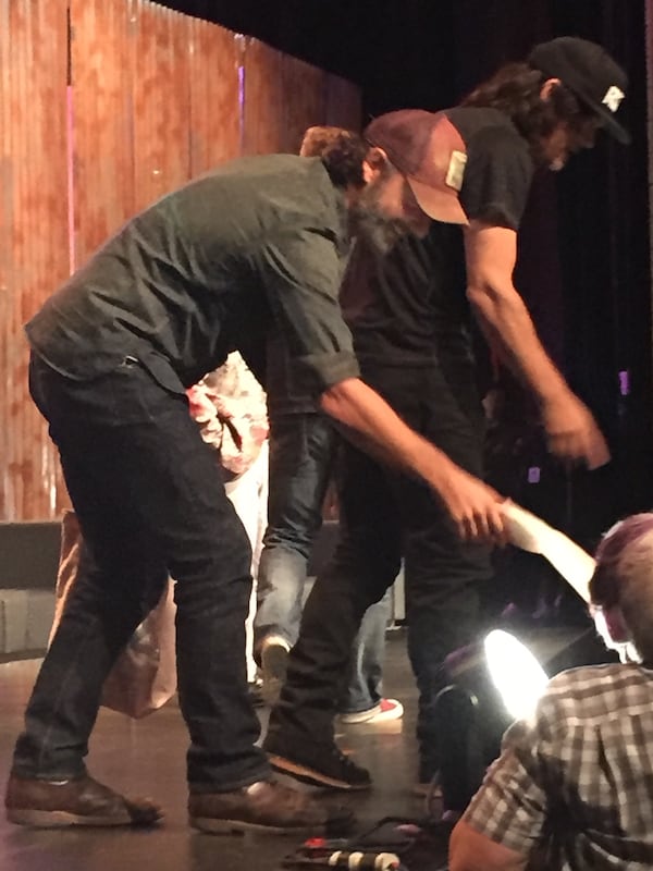 Andrew and Norman shaking hands with fans right after the panel ended. CREDIT: Rodney Ho/ rho@ajc.com