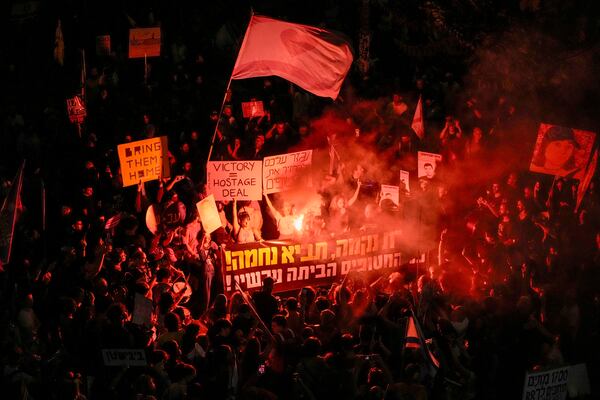 People protest against Prime Minister Benjamin Netanyahu's government and call for the release of hostages held in the Gaza Strip by the Hamas militant group, in Tel Aviv, Israel, Saturday, Oct. 19, 2024. (AP Photo/Mahmoud Illean)