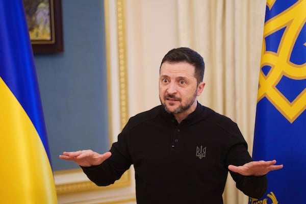 Ukrainian President Volodymyr Zelenskyy speaks to journalists during press conference in Kyiv, Ukraine, Wednesday, Feb. 26, 2025. (AP Photo/Evgeniy Maloletka)