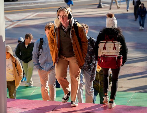 Georgia Tech students walk across campus amid freezing temperatures on Tuesday, Jan. 7, 2025 (Ben Hendren for the Atlanta Journal-Constitution)