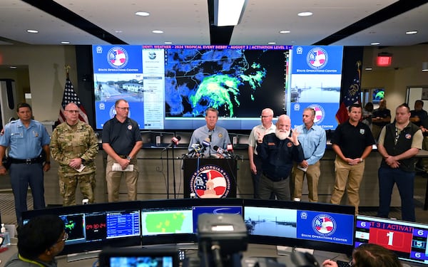 Gov. Brian Kemp speaks as he stands alongside emergency management officials and state agency representatives during a press briefing at The Georgia Emergency Management and Homeland Security Agency’s State Operations Center on Tuesday, August 6, 2024 in Atlanta. (Hyosub Shin / AJC)