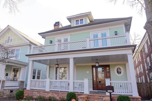 Michael and Nancy Halwig rebuilt their Midtown Atlanta home in 2009, using the 1916 plans for the Georgian Revival home. The exterior is painted in Composed with trim in Statuesque by Behr.