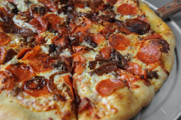 Meat and Cheese Pizza with Comet tomato sauce, White Oak Pastures ground beef, pepperoni, bacon and caramelized onions. (BECKY STEIN PHOTOGRAPHY)