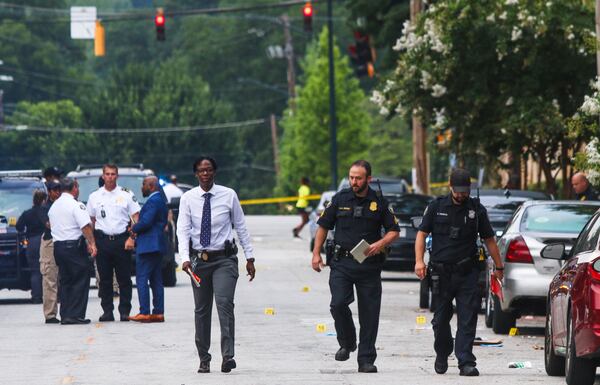 Atlanta police closed a block of Parkway Drive south of North Avenue after seven people were injured in a drive-by shooting Thursday morning. The scene is blocks away from Ponce City Market.