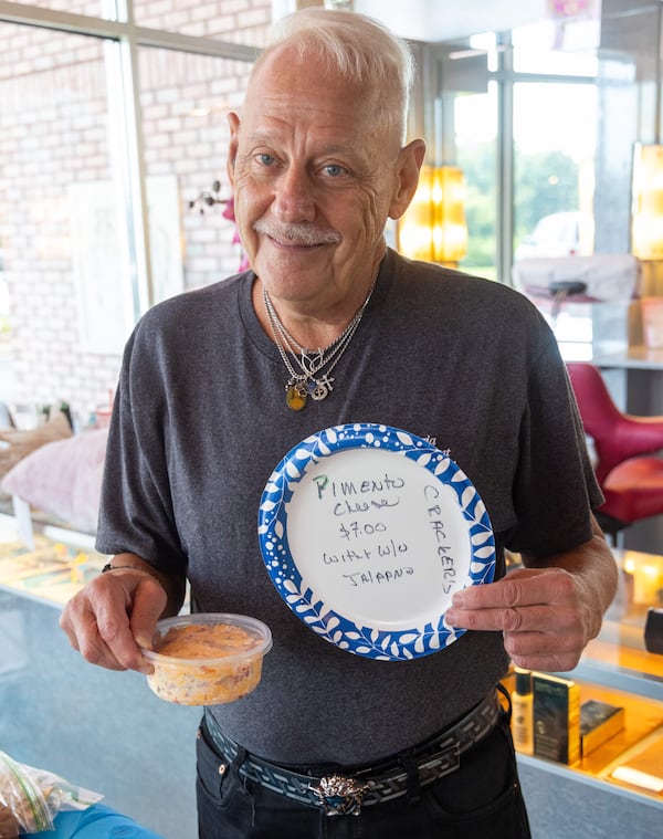 Two-time transplant recipient Lester E.Crowell Jr. hosts a bake sale with his motherÕs Pimento Cheese recipe at the Three-13 Salon, Spa & Boutique in Marietta to raise funds for the Georgia Transplant Foundation. Crowell, who runs the salon, has spent 12 years hosting fundraising events for the organization. PHIL SKINNER FOR THE ATLANTA JOURNAL-CONSTITUTION