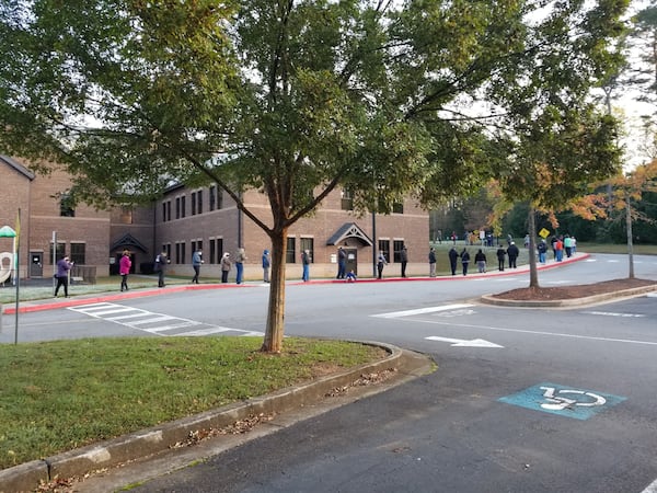 Voters waited in line at Noonday Baptist Church in Cobb County on Tuesday, Nov. 3, 2020.