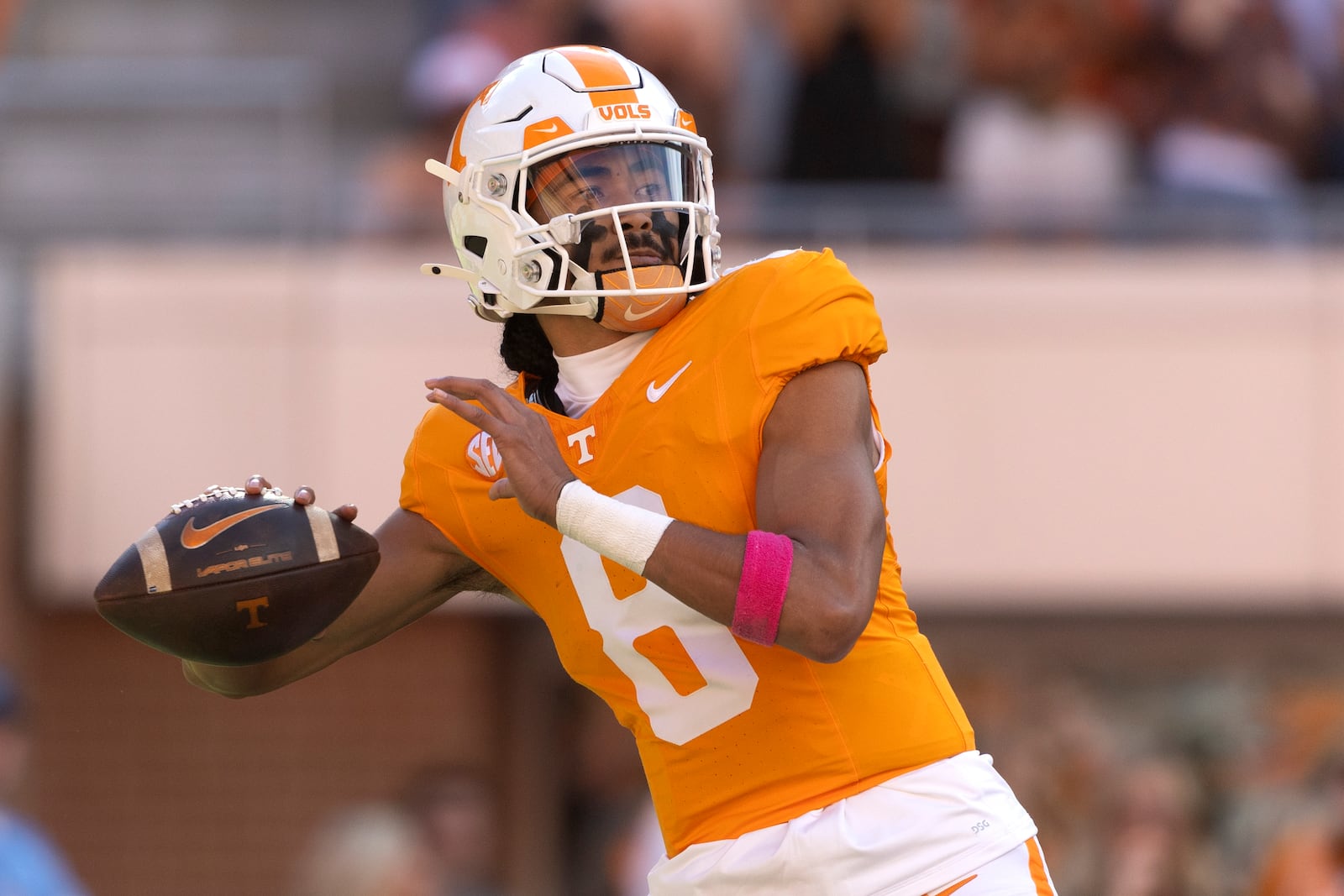 Tennessee quarterback Nico Iamaleava (8) throws to a receiver during the first half of an NCAA college football game against Alabama, Saturday, Oct. 19, 2024, in Knoxville, Tenn. (AP Photo/Wade Payne)