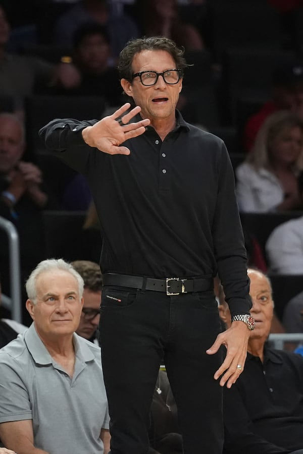 Atlanta Hawks head coach Quin Snyder gestures during the first half of an NBA basketball game against the Miami Heat, Wednesday, Feb. 26, 2025, in Miami. (AP Photo/Marta Lavandier)