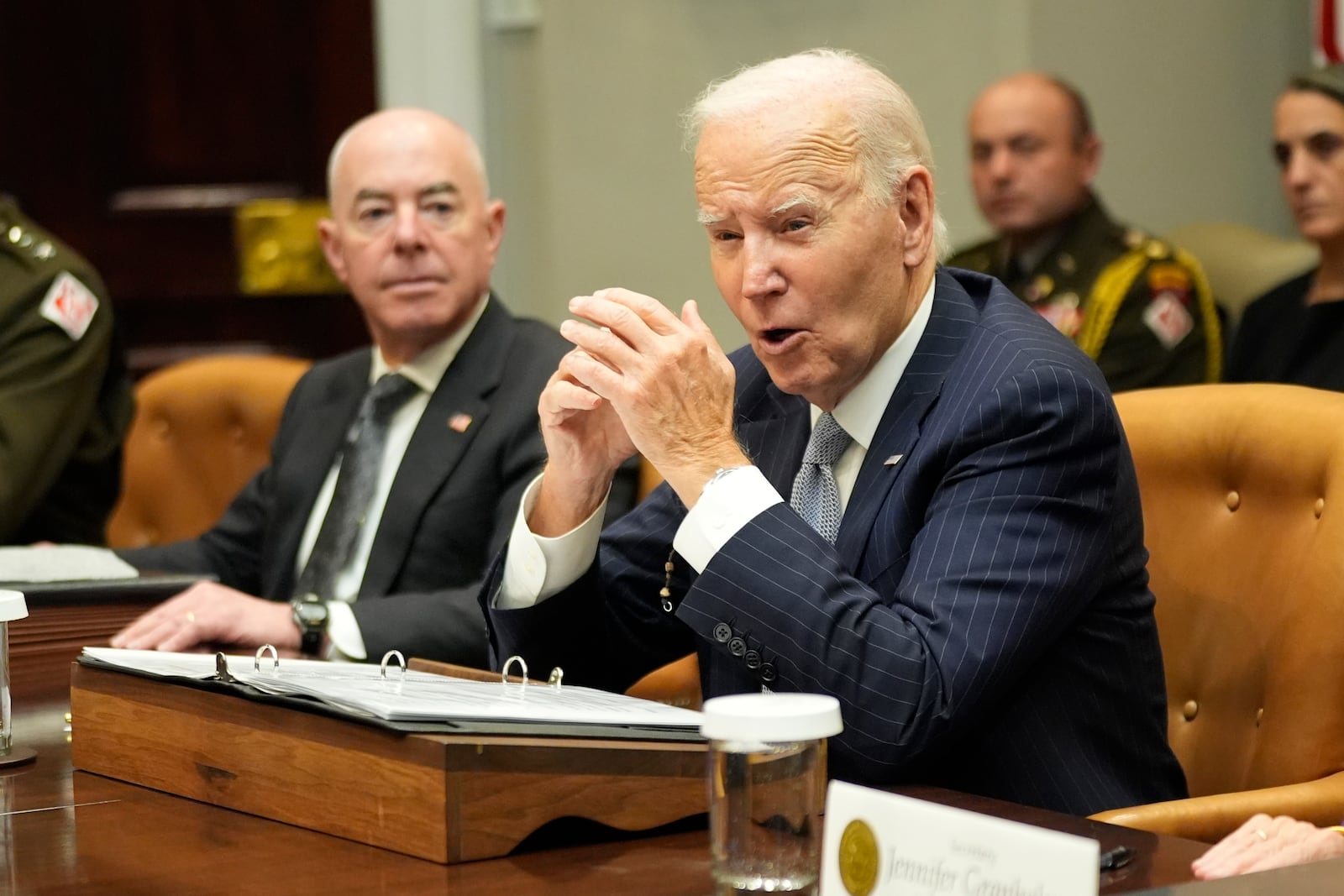 President Joe Biden speaks about the federal government's response to Hurricanes Milton and Helene as Homeland Security Secretary Alejandro Mayorkas listens, in the Roosevelt Room of the White House, Friday, Oct. 11, 2024, in Washington. (AP Photo/Manuel Balce Ceneta)