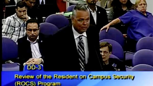 This Feb. 18, 2015 image taken from video provided by Broward County Public Schools shows school resource officer Scot Peterson during a school board meeting of Broward County, Fla. During the shootings at Marjory Stoneman Douglas High School on Feb. 14, 2018, Peterson took up a position viewing the western entrance of the building for more than four minutes after the shooting started, but "he never went in," Broward County Sheriff Scott Israel said at a news conference.  Peterson, was suspended without pay and placed under investigation, then chose to resign, Israel said  (Broward County Public Schools via AP)