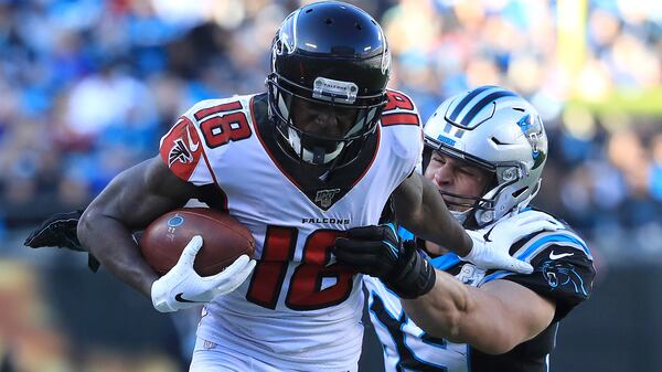 Carolina linebacker Luke Kuechly tackles Falcons wide receiver Calvin Ridley Sunday, Nov. 17. 2019, at Bank of America Stadium in Charlotte.