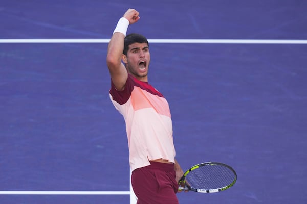 Carlos Alcaraz, of Spain, reacts to winning a point against Jack Draper, of Great Britain, during their semifinals match at the BNP Paribas Open tennis tournament Saturday, March 15, 2025, in Indian Wells, Calif. (AP Photo/Mark J. Terrill)