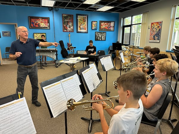 Savannah Country Day School Music Director, David Elliott instructs students from the middle school's jazz band. He has been teaching at the school since 2000.