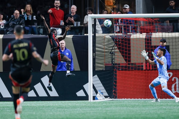 Atlanta United forward Emmanuel Latte Lath leapt in the air to connect with a header and score the team's first (and only) goal against Miami on Sunday night.