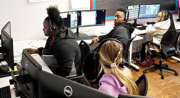 From left, Dakota Outman, Hannah Merrell, LaVon Bledsoe and Mya Crafter discuss the simulation. Brainerd High has launched a new 911 dispatch pathway this fall as part of the Future Ready Institute of Law, First Responders and Forensic Science. (Photo Courtesy of Robin Rudd)