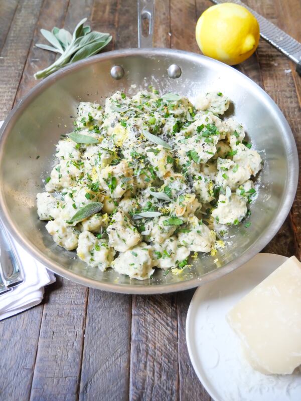 Herb Rivels with Garlic Butter: Rivels can be easily flavored with fresh herbs, lemon zest and cheese and served as a standalone dish. (Chadwick Boyd for The Atlanta Journal-Constitution)