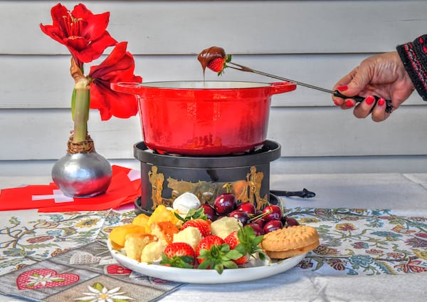 Chocolate Fondue can be served with items such as strawberries, cherries, pineapple, pound cake and marshmallows. (Styling by Lisa Hanson / Chris Hunt for the AJC)