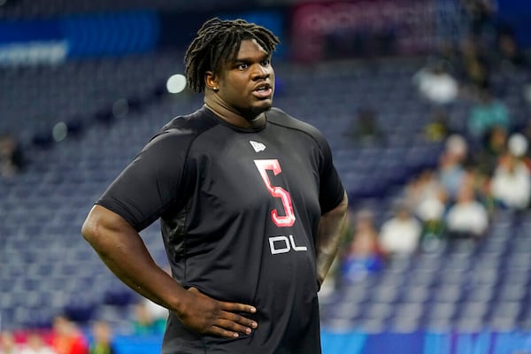 Georgia defensive lineman Jordan Davis (05) walks on the field at the NFL football scouting combine in Indianapolis, Saturday, March 5, 2022. (AP Photo/Steve Luciano)