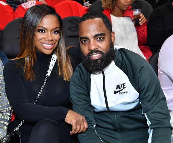 ATLANTA, GA - OCTOBER 24:  Kandi Burruss and Todd Tucker attend the Dallas Mavericks Vs Atlanta Hawks 2018-2019 NBA Home Opener Game at State Farm Arena on October 24, 2018 in Atlanta, Georgia.  (Photo by Paras Griffin/Getty Images)