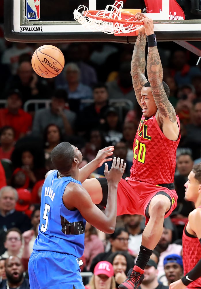 Photos: Hawks edge Magic in home opener