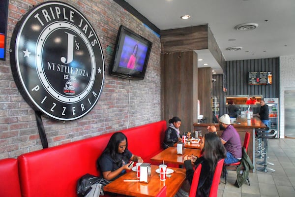 Dining area and ordering counter at Triple Jay's Pizza. (Contributed by Chris Hunt Photography)