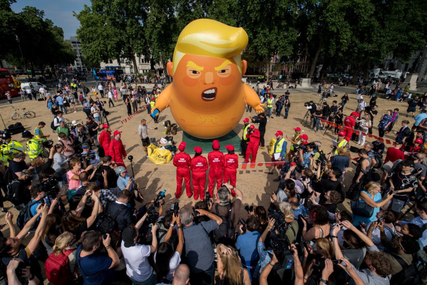 Photos: Protesters greet Trump during UK visit