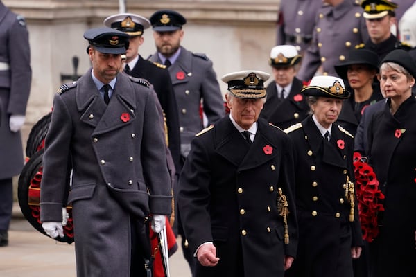 Britain's King Charles III, centre, with Prince William ,left, and Princess Anne attend the Remembrance Sunday Service at the Cenotaph in London, Sunday, Nov. 10, 2024. (AP Photo/Alberto Pezzali, Pool)