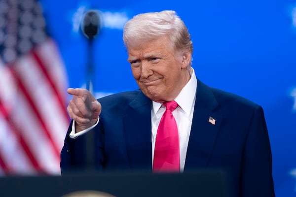 President Donald Trump gestures as he arrives to speak at the Conservative Political Action Conference, CPAC, at the Gaylord National Resort & Convention Center, Saturday, Feb. 22, 2025, in Oxon Hill, Md. (AP Photo/Jose Luis Magana)