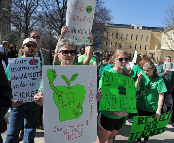 February 18, 2014 Atlanta: Supporters of T.R.A.G.I.C. (Teachers Rally to Advocate for Georgia Insurance Choices) , including retired teacher Julie Jarrett, gathered outside the state Capitol Tuesday, February 18 to protest their health care insurance. BRANT SANDERLIN /BSANDERLIN@AJC.COM