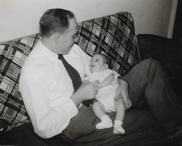 As a baby, writer Bill King is held by his namesake father. (Courtesy of the King family)