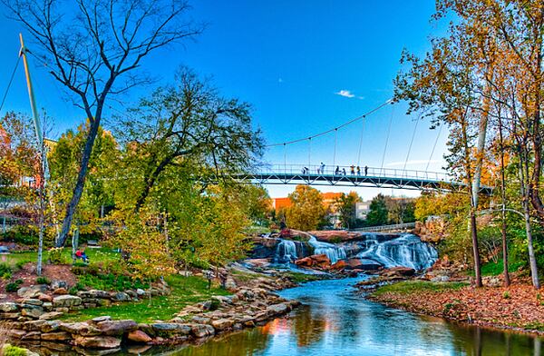 The Liberty Bridge suspending across Falls Park on the Reedy River.