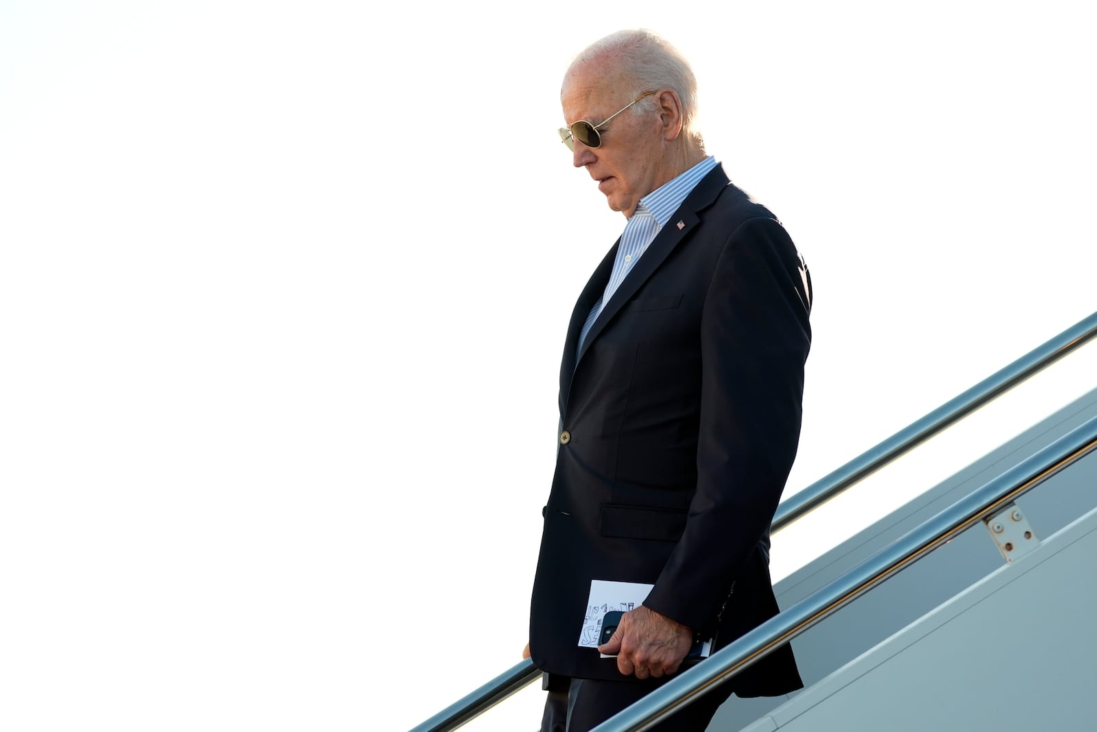 President Joe Biden arrives on Air Force One at Delaware Air National Guard Base in New Castle, Del., Saturday, Nov. 2, 2024. (AP Photo/Manuel Balce Ceneta)