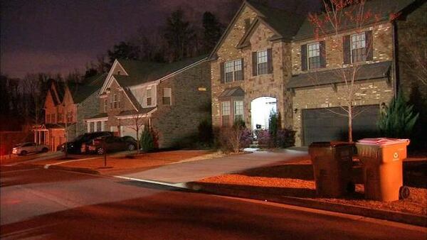 A man was taken into custody after a woman's body was found in a Forsyth County home. (Credit: Channel 2 Action News)